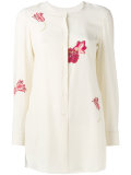 floral-print shirt