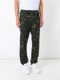 camouflage print trousers