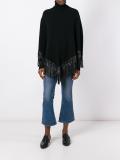 cable knit fringed poncho