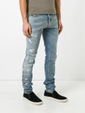 distressed slim-fit jeans