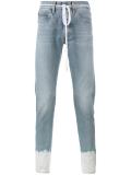 sprayed hem jeans 