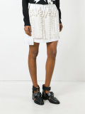 fringed asymmetric skirt