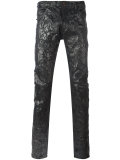 coated effect trousers
