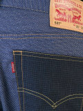 contrast pockets bootcut jeans