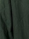collarless quilted coat
