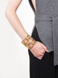 caged camellia cuff