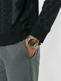 round yellow detailing analog watch