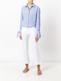 flared hem trousers