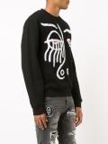 abstract face print sweatshirt