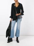 lion pin crossbody bag