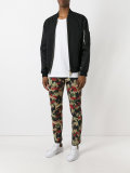 camouflage print trousers 