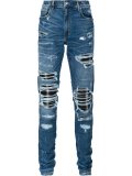 distressed slim jeans
