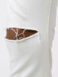 ripped knee skinny jeans