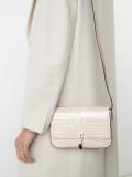 crocodile-embossed satchel