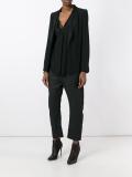 curved cropped trousers 