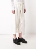 'Left Wrap' trousers