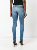 distressed skinny jeans
