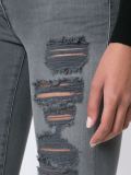 distressed skinny jeans 