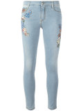 floral patch skinny jeans