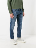 distressed slim-fit jeans