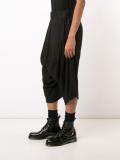 drop-crotch cropped trousers