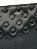 polka dot embossed clutch