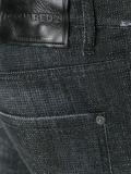 Skater whiskered microstudded jeans