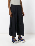 flared pleated trousers