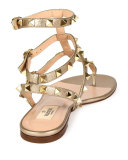 Rockstud Metallic Leather Flat Gladiator Sandal, Skin