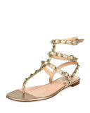 Rockstud Metallic Leather Flat Gladiator Sandal, Skin